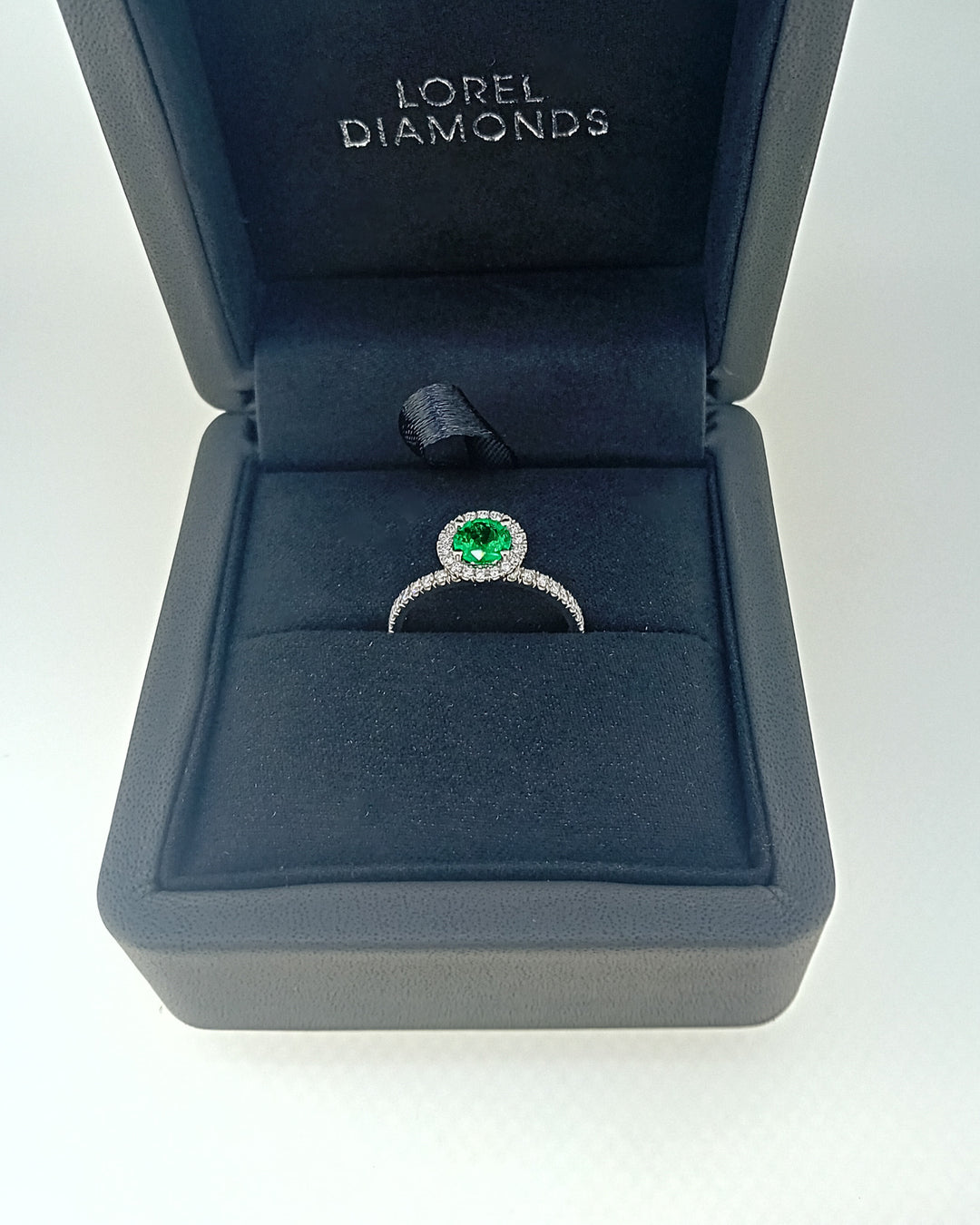 Never-Worn Platinum Zambian Emerald & Diamond Engagement Ring