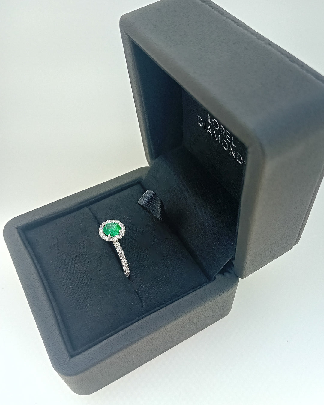 Never-Worn Platinum Zambian Emerald & Diamond Engagement Ring