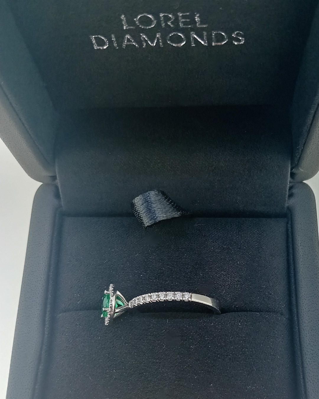 Never-Worn Platinum Zambian Emerald & Diamond Engagement Ring