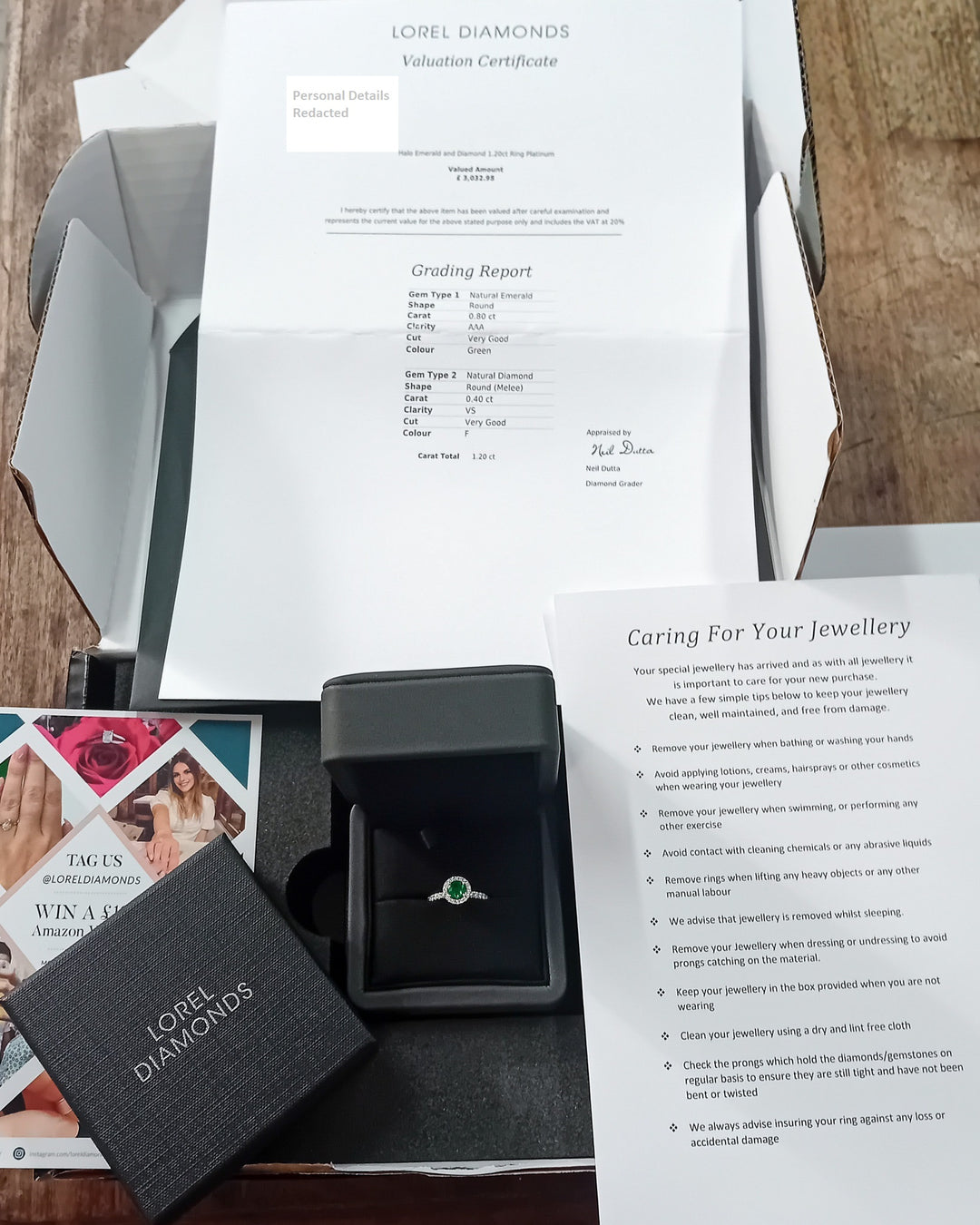Never-Worn Platinum Zambian Emerald & Diamond Engagement Ring