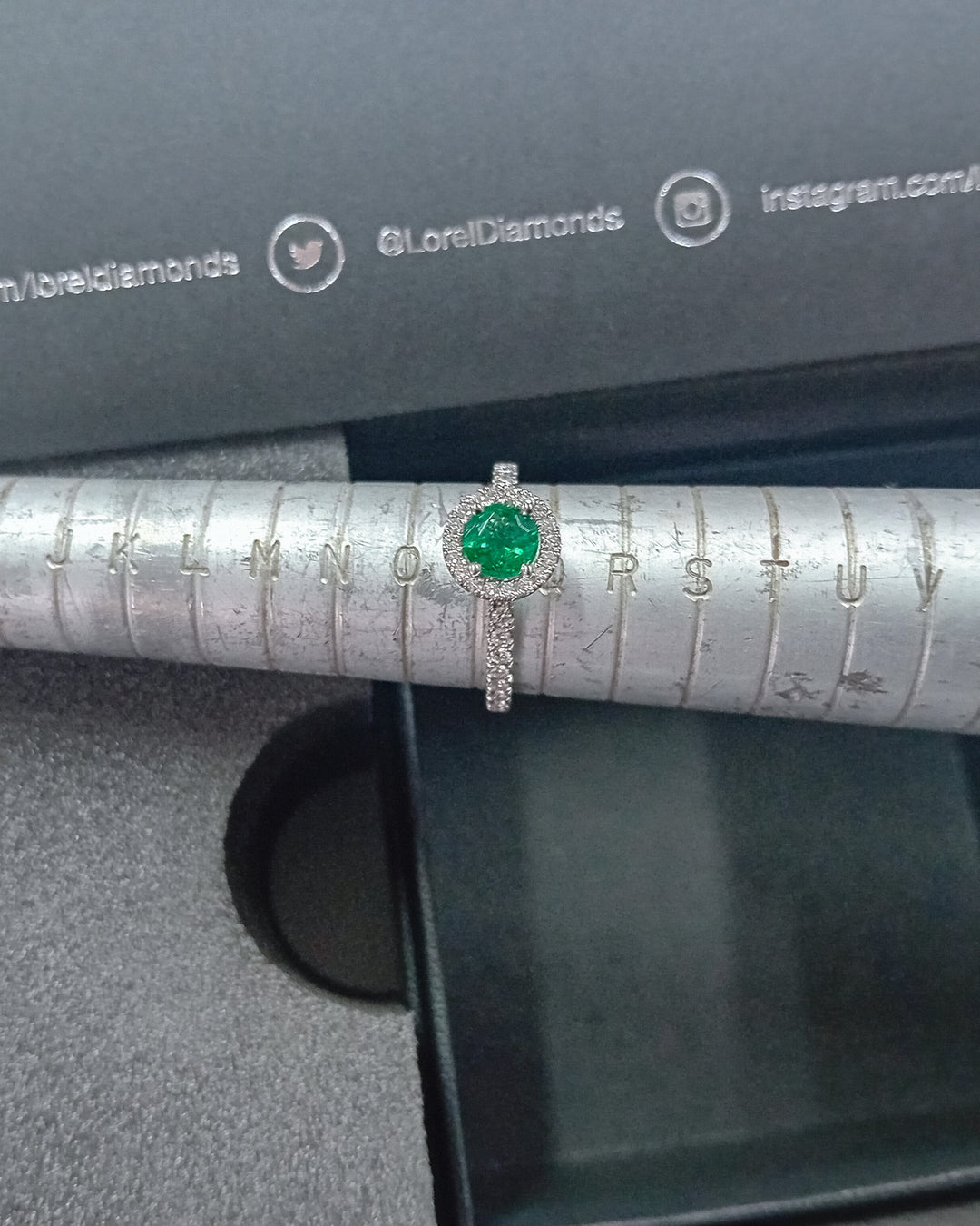 Never-Worn Platinum Zambian Emerald & Diamond Engagement Ring